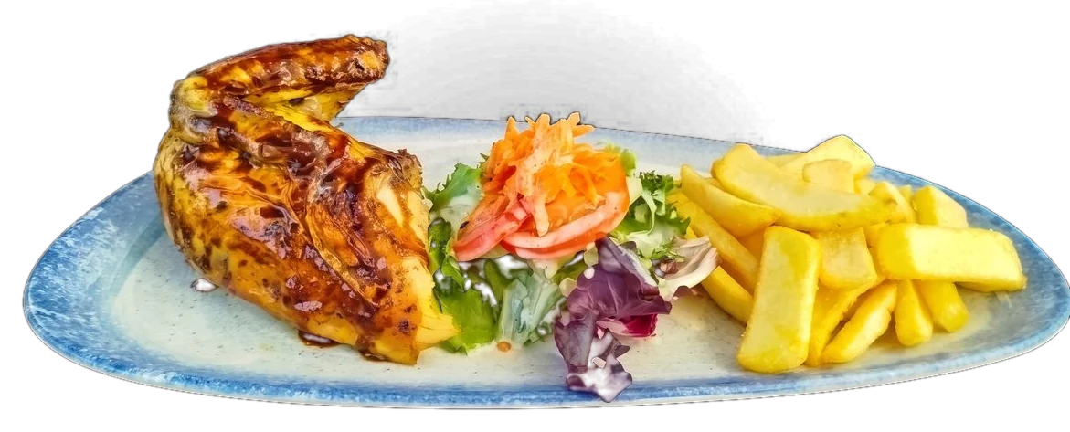Pollo a la brasa en la mesa con sus cremas